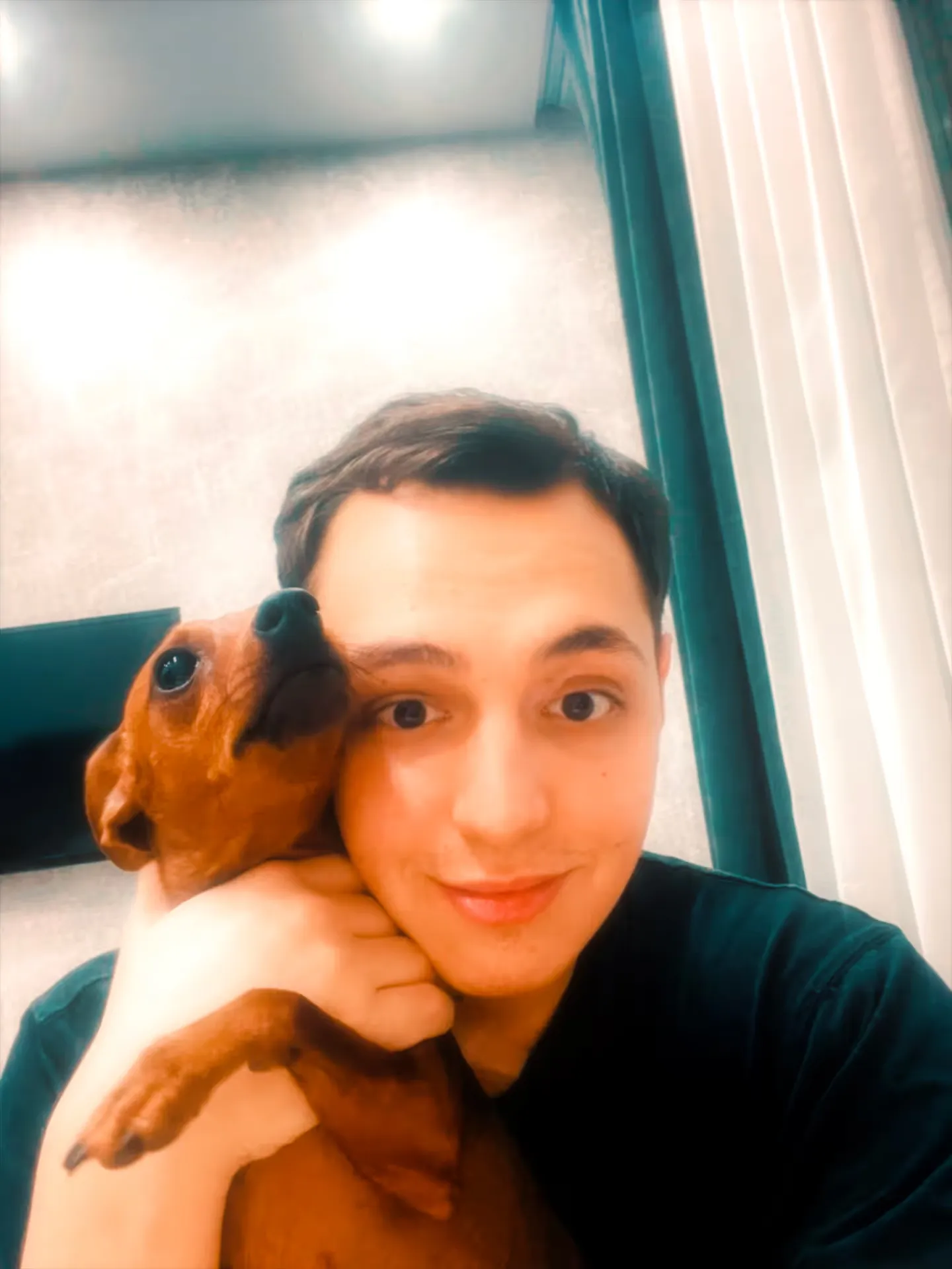 Bogdan Kolomiyets with his dog, Barbara.