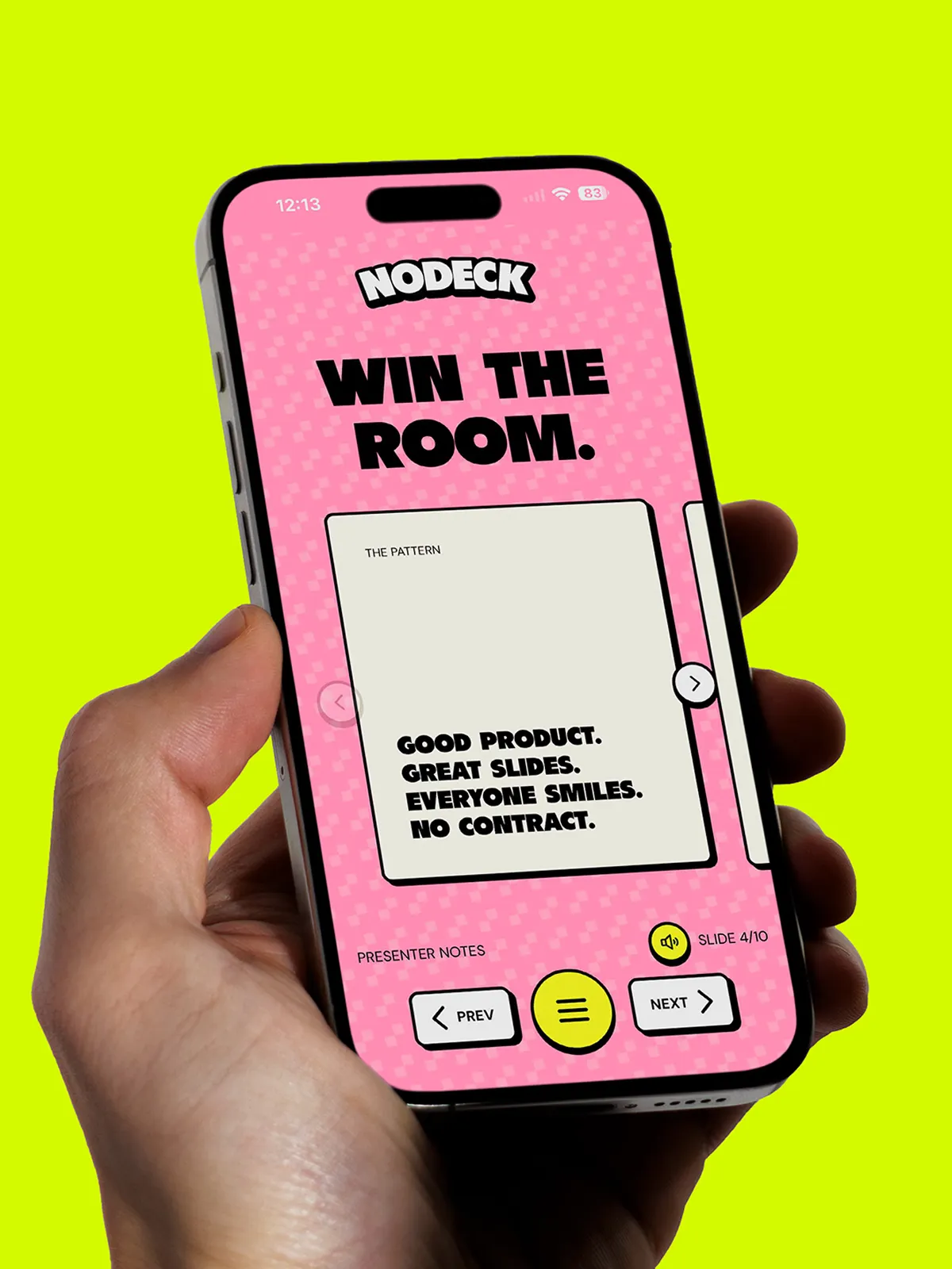 Hand holding a phone showing the Nodeck app with a pink checkered screen and Win the Room headline.